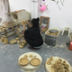 Celine Wong, 24, from Shanghai, learns ceramics in her spare time from Wutong artist Longshuo in 93 Art Park, a former factory that was turned into an art studio.